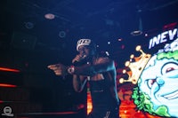 a man is singing into a microphone